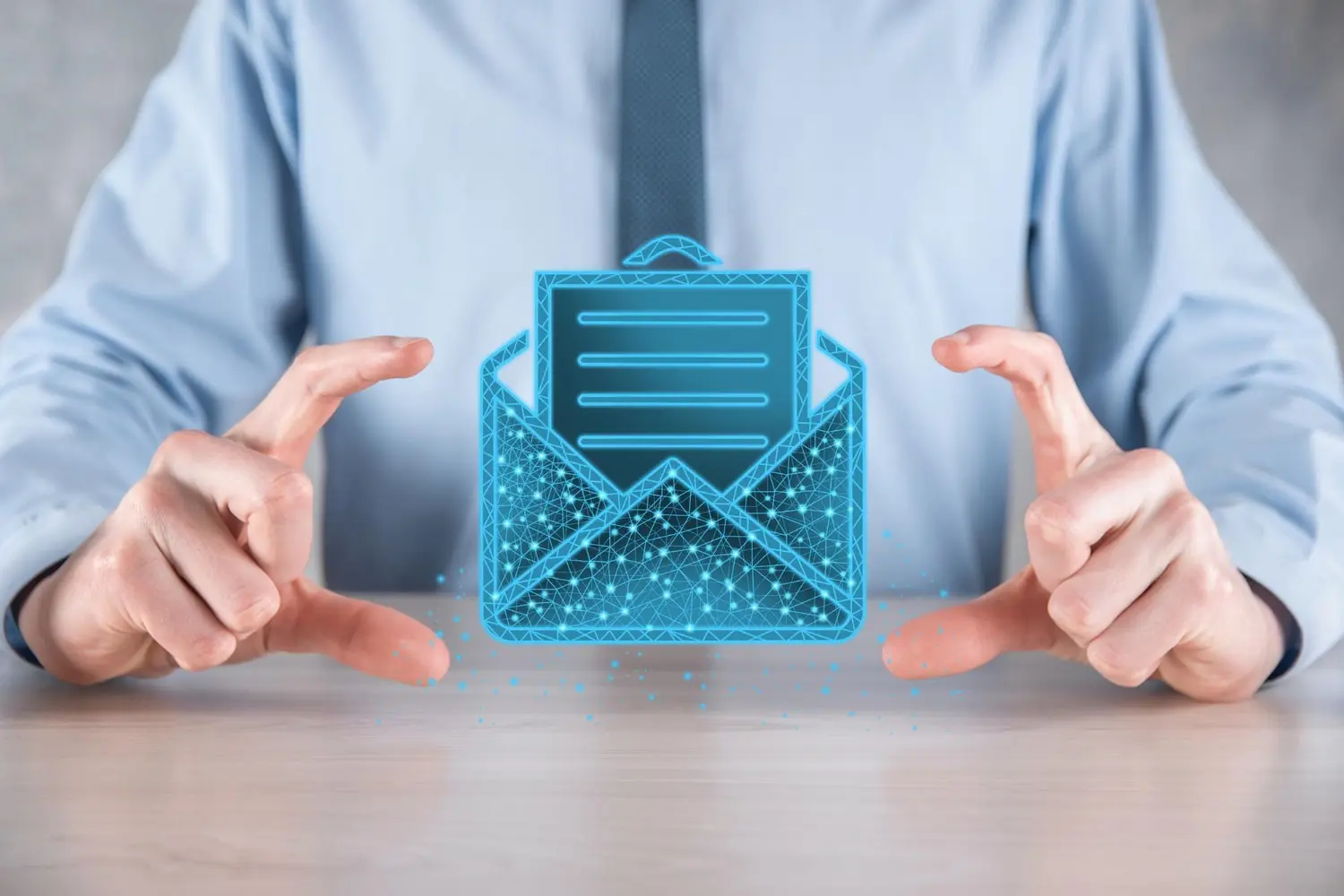 An office worker holding a digital envelope with a letter in it